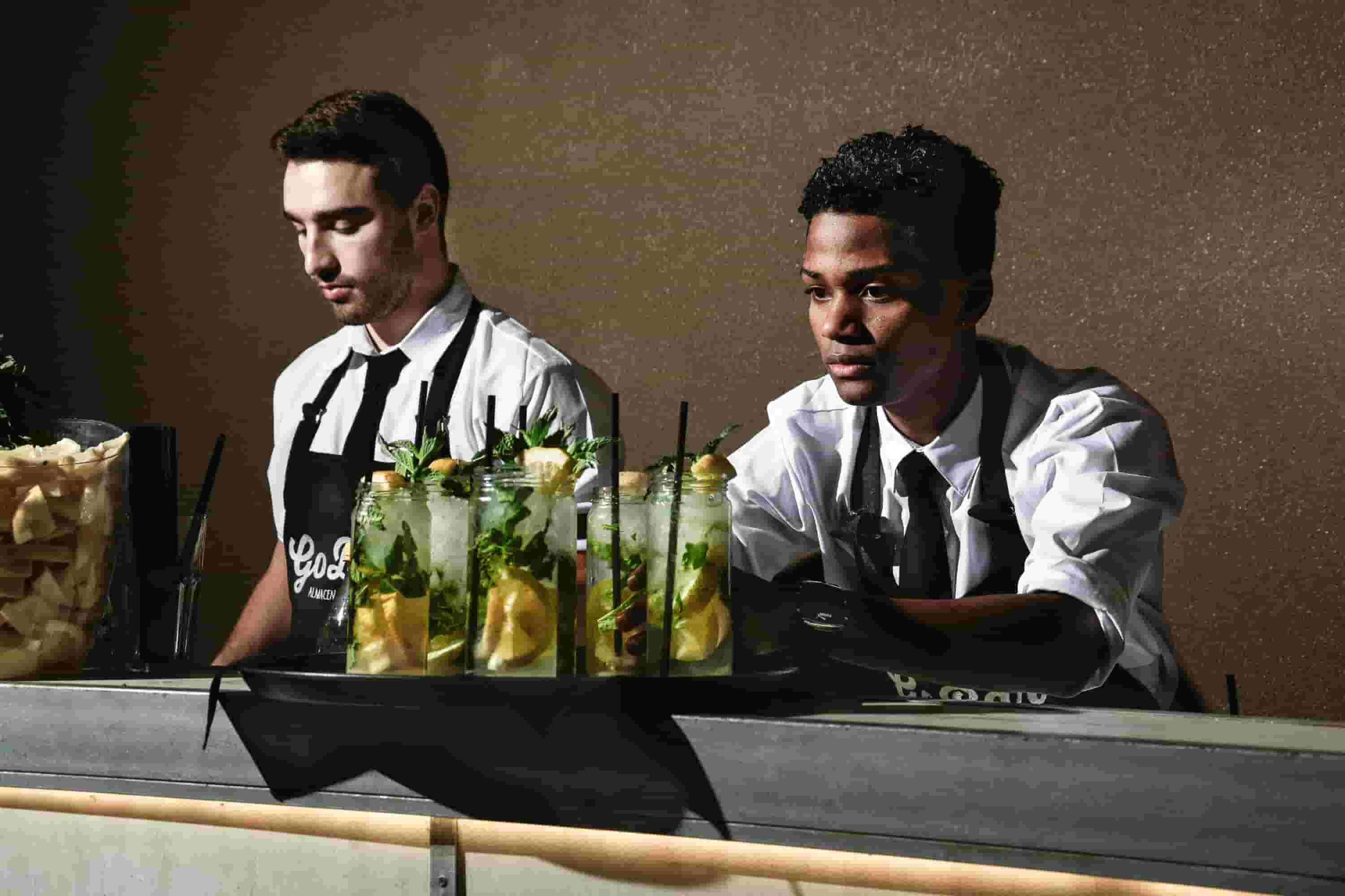 Bartenders Mixing Drinks